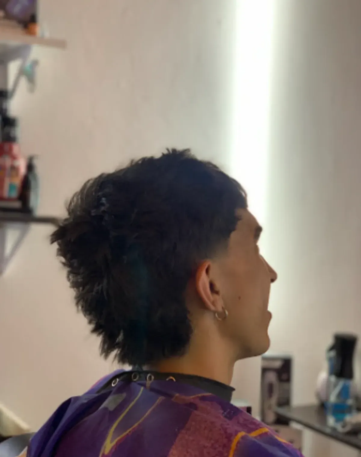 Mullet texturizado con fade realizado en Charlie's Studio